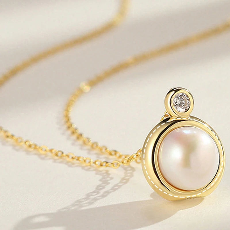 Elegant Gold Pearl Pendant Necklace with Crystal Accent